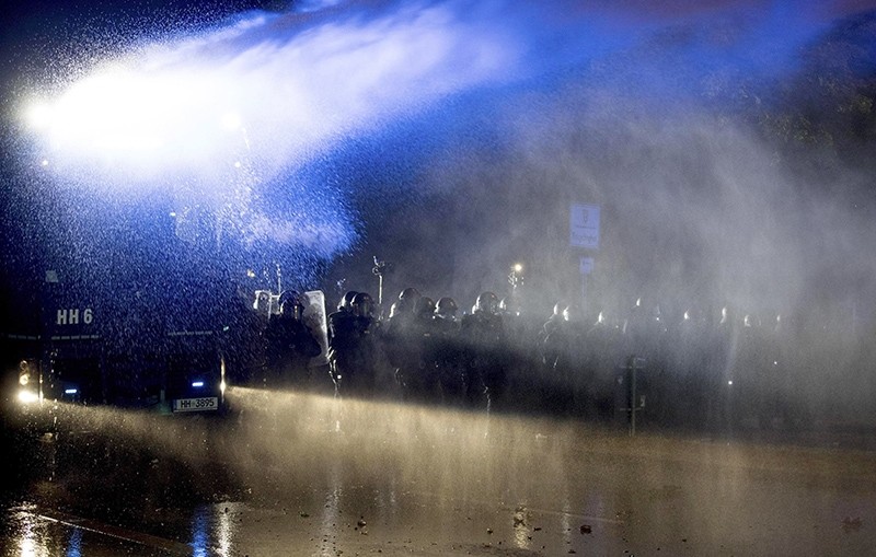 Protesters are sprayed by a German police water cannon after the G20 summit in Hamburg, northern Germany, 09 July 2017. (EPA Photo)