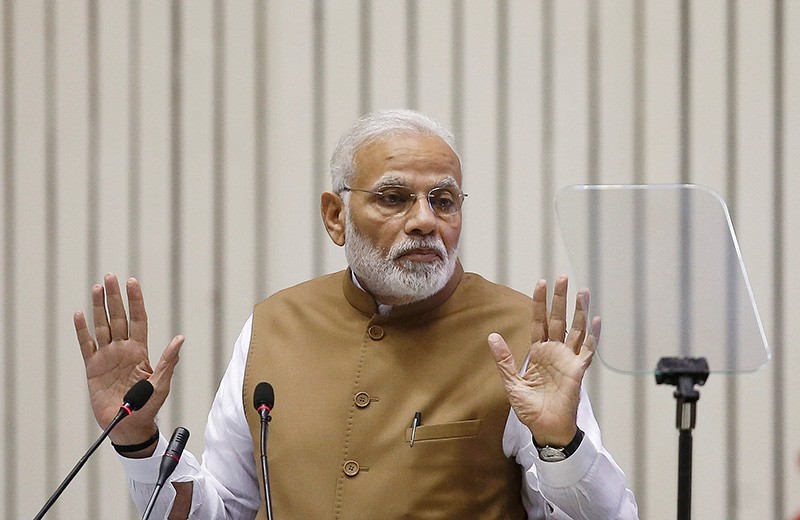 India's Prime Minister Narendra Modi gestures as he addresses the gathering during the 'Global Mobility Summit' in New Delhi, India, Sept. 7, 2018. (Reuters Photo)