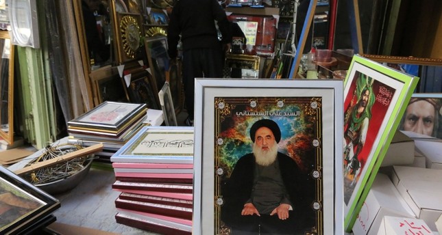 صور السيستاني في أحد محلات بغداد الفرنسية