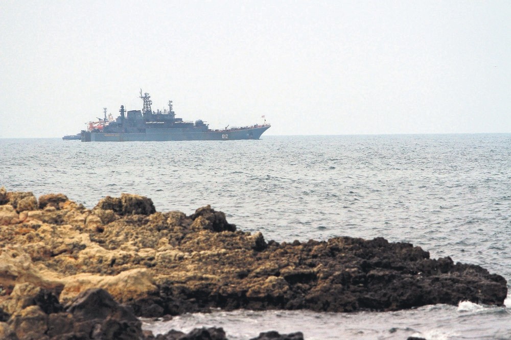 A Russian naval ship sails near Sevastopol, Crimea, March 9, 2014.