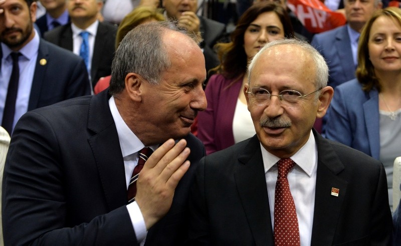 Muharrem Ince, left, and main opposition Republican People's Party (CHP) leader Kemal Ku0131lu0131u00e7darou011flu talk during a CHP meeting which is held to determine the presidential candidate in Ankara, Turkey, May 4, 2018. (EPA Photo) 