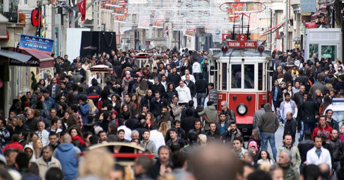 People walk through Istanbul's crowded iconic streets on u0130stiklal Avenue, Taksim.