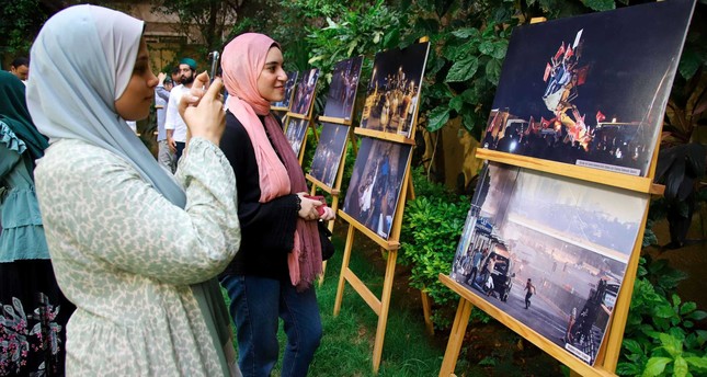 معهد يونس إمره الثقافي التركي بالقاهرة ينظم فعالية لإحياء الذكرى السابعة لمحاولة الانقلاب الفاشلة، 15-7-2023 صورة: الأناضول