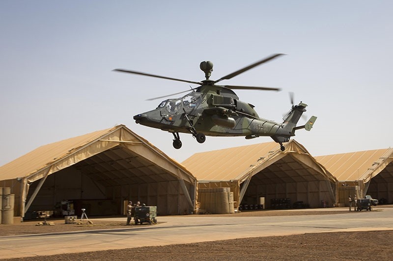 A handout photo made available by the German Bundeswehr armed forces shows a Tiger combat helicopter landing in a camp during MINUSMA mission in Gao, Mali, March 25, 2017. (EPA Photo)