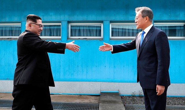 Image result for kim jong un and moon jae in handshake