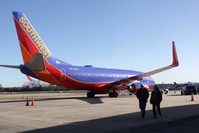 In this Jan. 13, 2014, file photo, Southwest Airlines Flight 4013 sits at the M. Graham Clark Downtown Airport in Hollister, Mo. (AP Photo)