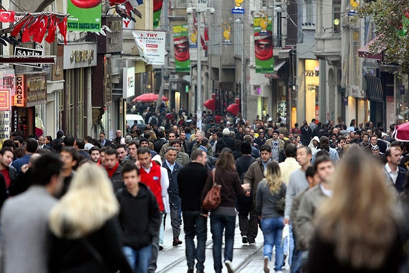 In this undated file photo, people walk on the Istikal Street, one of the busiest streets in Istanbul, Turkey.