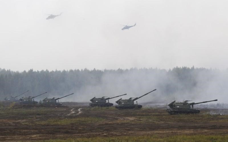 Armoured vehicles and helicopters take part in the Zapad 2017 war games at a range near the town of Borisov, Belarus September 20, 2017. (Reuters Photo)