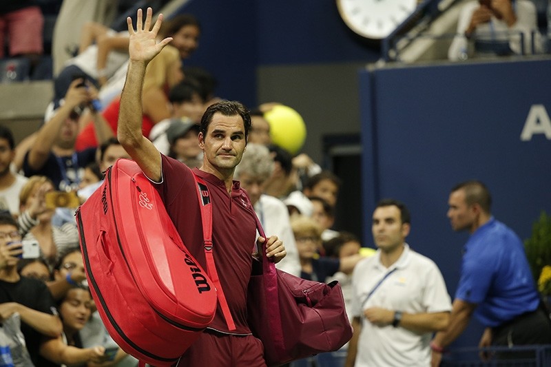 Roger Federer waves to fans before leaving the court for the last time at the U.S. Open in New York on Sept. 4, 2018. (AA Photo)