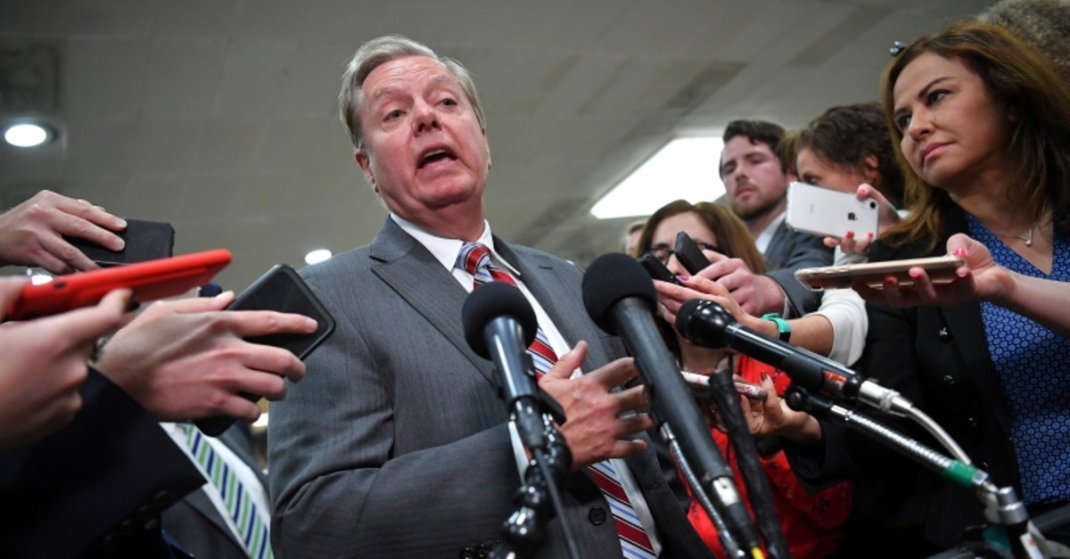 US Senator from South Carolina Lindsay Graham gives a statement after closed-door briefing on Iran in the auditorium of the Capitol Visitors Center in Washington, DC on May 21, 2019. (AFP Photo)
