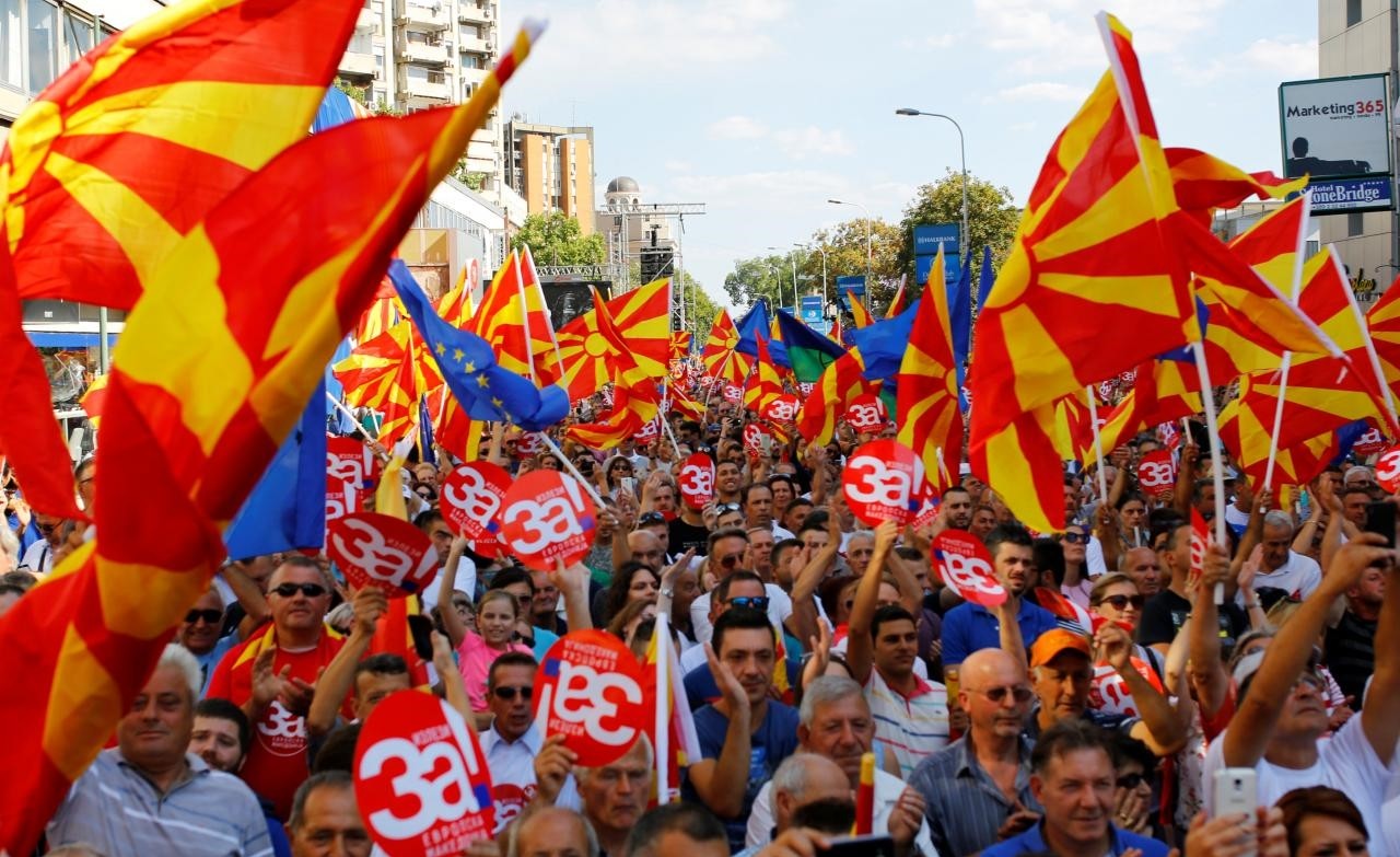 People hold placards reading 'Yes for European Macedonia' during a march in support of a referendum on changing the country's name and its NATO and EU membership bids in Skopje, Macedonia September 16, 2018. (Reuters Photo)
