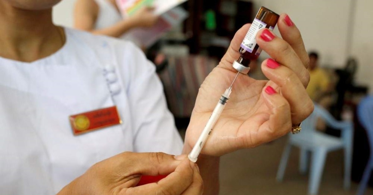 A nurse prepares a measles-rubella vaccine in Yangon, Myanmar, Nov. 26, 2019. (Reuters Photo)