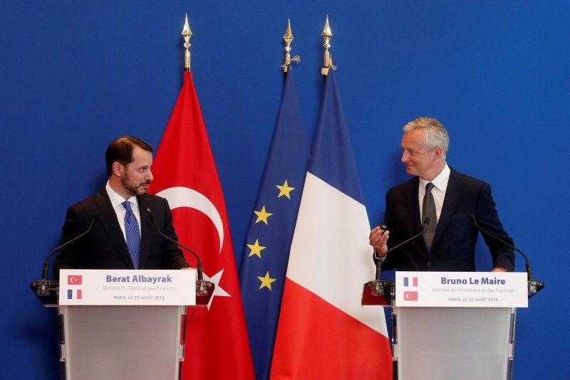 Treasury and Finance Minister Berat Albayrak (L) and his French counterpart Bruno Le Maire and Turkish attend a joint news conference after a meeting at the Bercy Finance Ministry in Paris, France, August 27, 2018. (Reuters Photo)