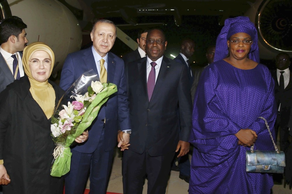 President Recep Tayyip Erdou011fan and first lady Emine Erdou011fan were welcomed by Senegalese President Macky Sall and Senegalese first lady Marieme Faye Sall, in Dakar, late Wednesday.