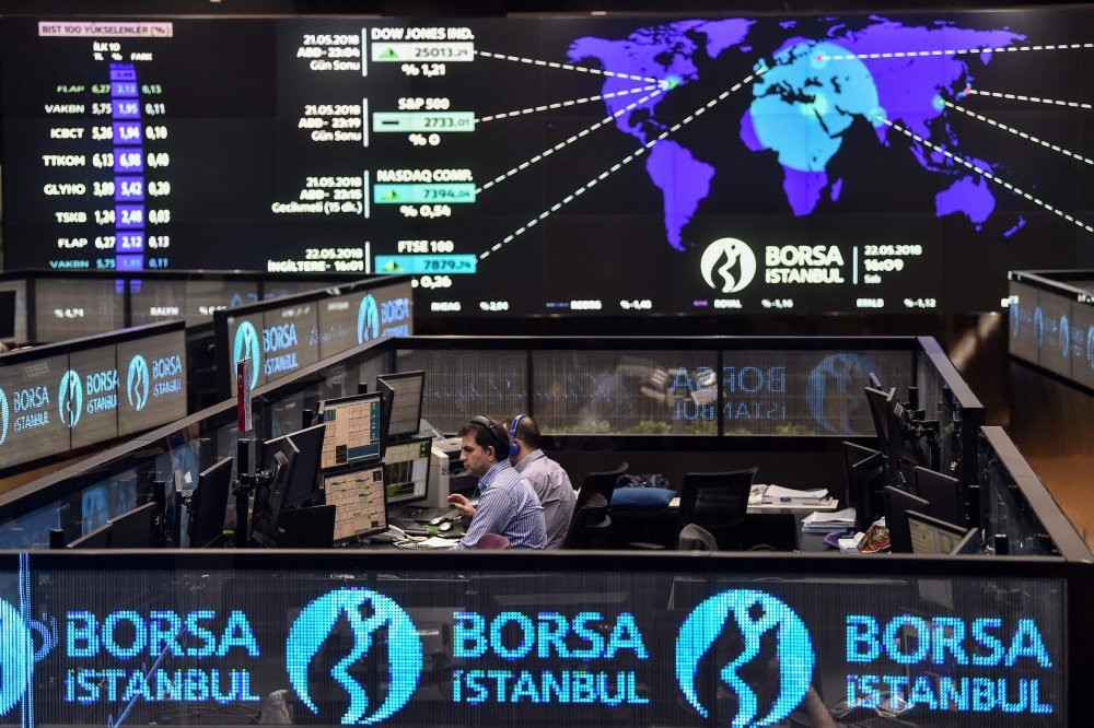 Traders work at their desks on the floor of the Borsa Istanbul in Istanbul, May 22.