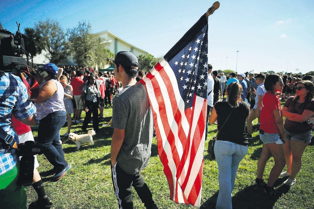 Students of Marjory Stoneman Douglas High School gather at Pine Trail Park, Florida, Feb. 15.