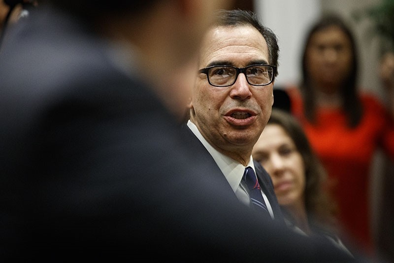 Treasury Secretary Steve Mnuchin speaks during a meeting with President Donald Trump in the White House, Thursday, Aug. 23, 2018, in Washington. (AP Photo)