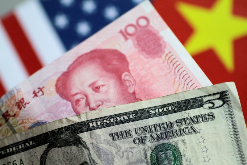 U.S. Dollar and China Yuan notes are seen in this picture illustration June 2, 2017. (REUTERS Photo)