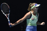Sofia Kenin of the U.S. reacts after winning the first set against Australia's Ashleigh Barty during their semifinal match at the Australian Open tennis championship in Melbourne, Australia, Thursday, Jan. 30, 2020. (AP Photo)