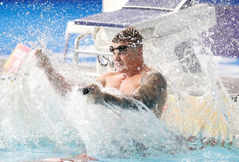 Adam Peaty of Great Britain reacts after winning the 100 meters breaststroke men final setting a new world record at the European Swimming Championships in Glasgow, Scotland, Saturday, Aug. 4, 2018. (AP Photo)