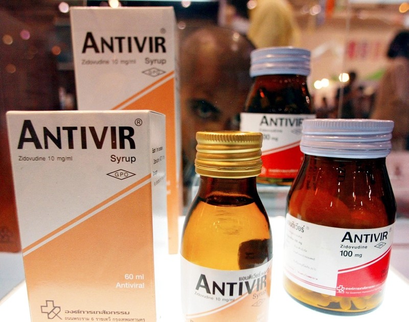 In this file photograph taken on July 15, 2004, a delegate looks at the ,Antivir, anti-virus medicine products by Thai Pharmacy Authority on display during the 15th International AIDS Conference in Bangkok. (AFP Photo)