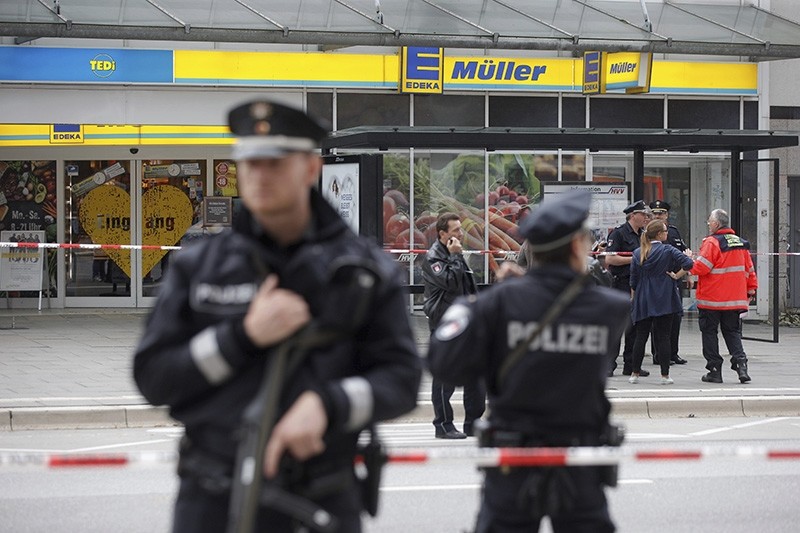 Police officers secure the area after a knife attack at a supermarket in Hamburg, Germany, Friday, July 28, 2017 (AP File Photo)