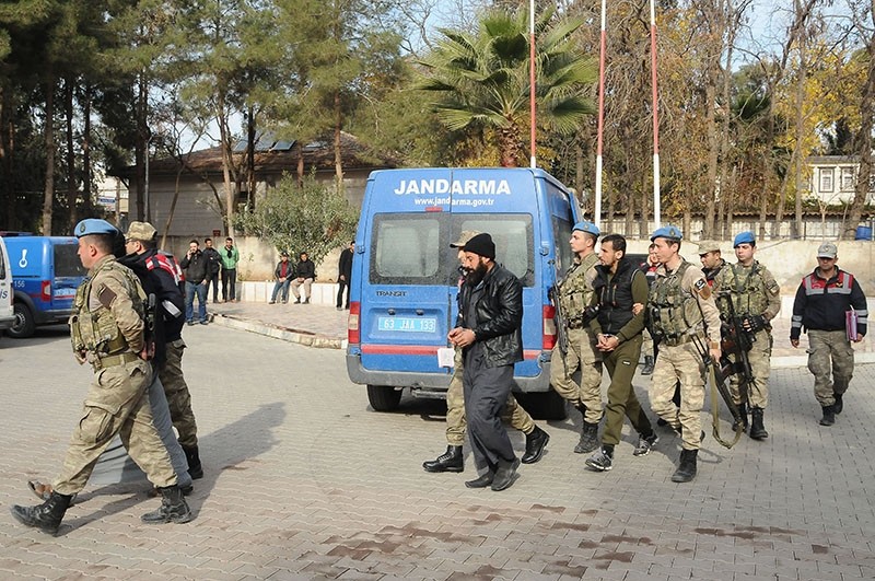 Gendarmerie officers escort detained Daesh suspects to courthouse in u015eanlu0131urfa, Turkey, on Dec. 18, 2017. (DHA Photo)