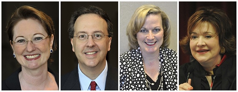 This combination of photos shows West Virginia state Supreme Court justices, from left, Robin Davis on Oct. 3, 2012, Allen Loughry on Oct. 3, 2012, Beth Walker on March 16, 2016 and Margaret Workman on Dec. 29, 2008. (AP Photo)