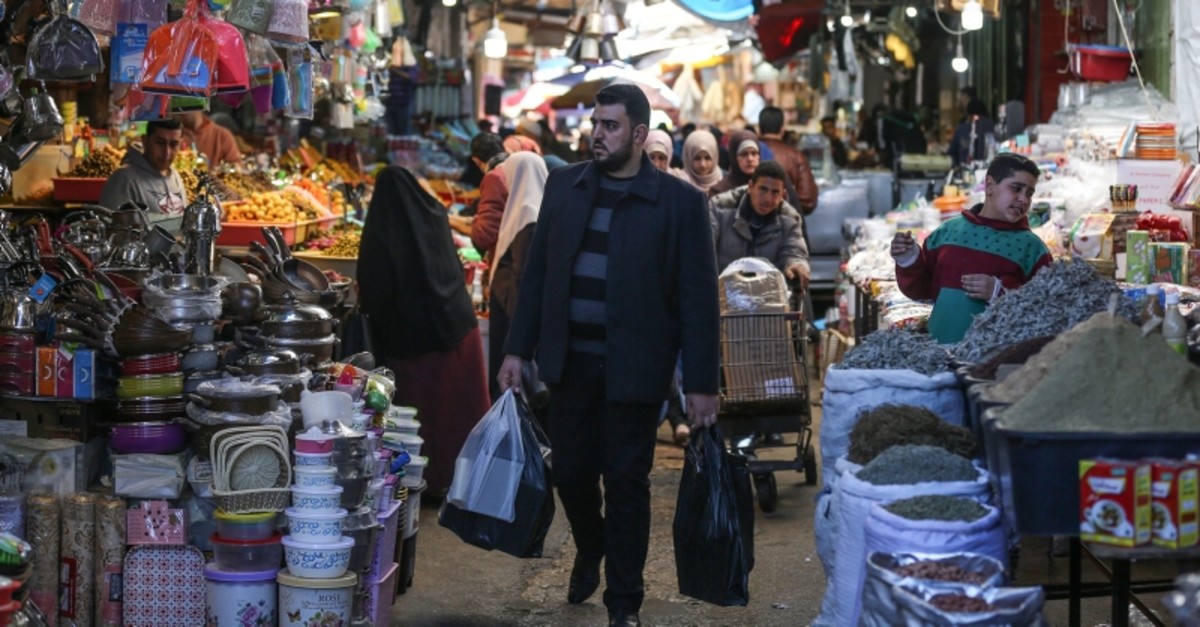 A Palestinian man walks in a marketplace in Gaza, April 13, 2019. (AA Photo)