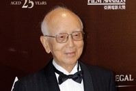 In this March 21, 2011, photo, Hong Kong film producer Raymond Chow receives the Lifetime Achievement award at the Asian Film Awards in Hong Kong. (AP Photo)