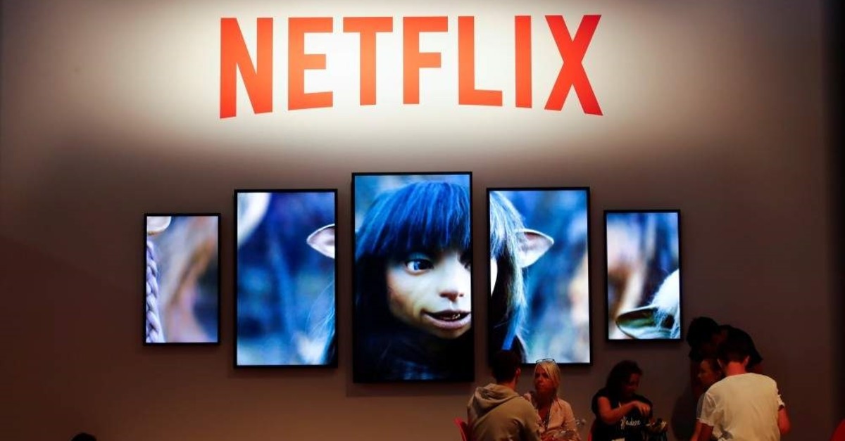 Gamers and visitors rest at the booth of Netflix during Europe's leading digital games fair Gamescom, Cologne, Germany, Aug. 21, 2019. (Reuters Photo)