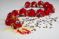 In the ,Dragon Power, workshop, participants revitalize mythological characters by designing their own cute dragons using recycled materials, multi-crayon, rope and chenille.