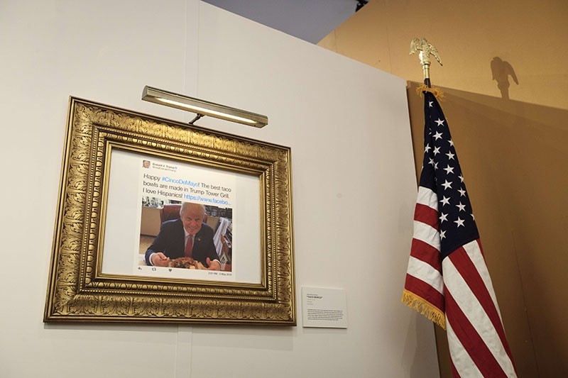 A Cinco de Mayo related tweet is displayed at The Daily Show-produced 'Donald J. Trump Presidential Twitter Library,' June 16, 2017 in New York City. (AFP Photo)