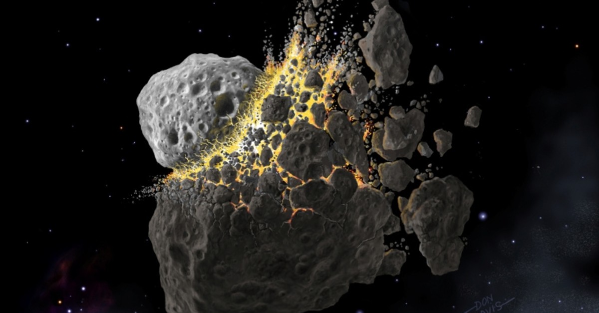 This illustration shows a giant asteroid collision between Mars and Jupiter that occurred 466 million years ago and produced the dust that led to an ice age on Earth (Reuters Photo)