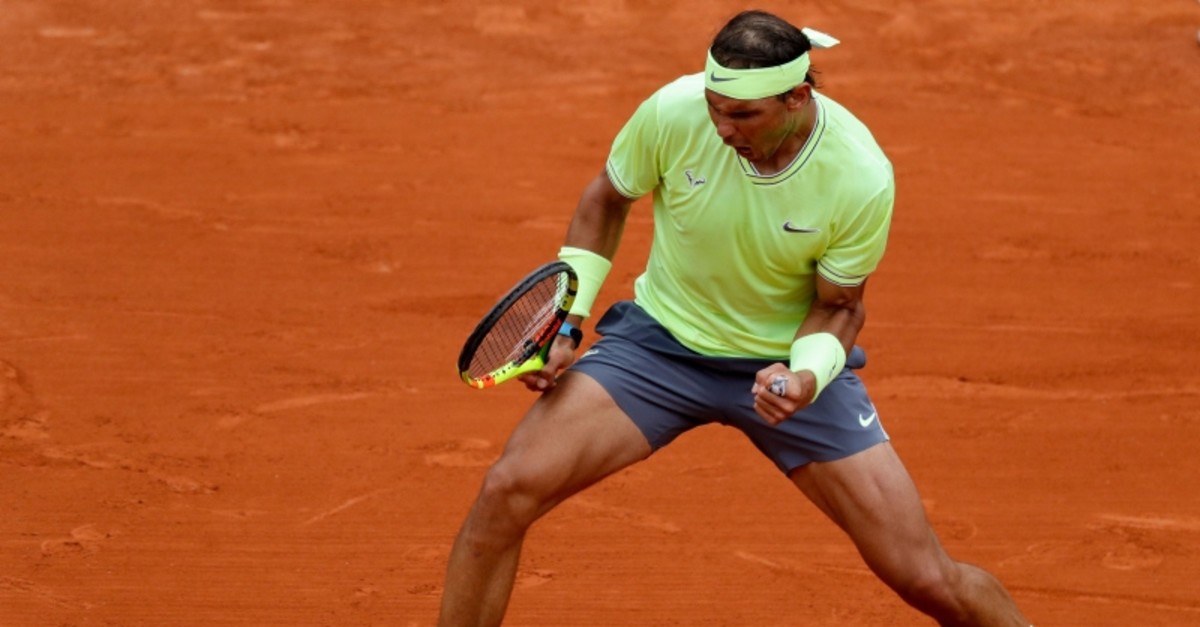 Spain's Rafael Nadal reacts after winning a point against Austria's Dominic Thiem during their men's singles final match, on day fifteen of The Roland Garros 2019 French Open tennis tournament in Paris on June 9, 2019. (AFP Photo)