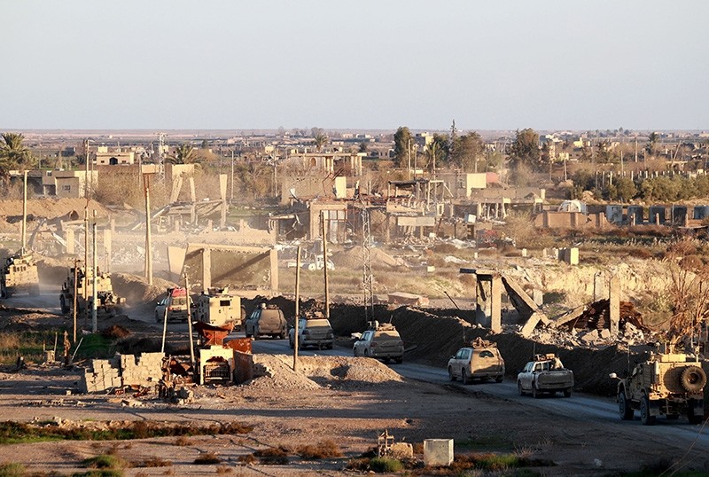 Photo shows U.S. Army vehicles supporting YPG-stocked Syrian Democratic Forces (SDF) in Hajin, in Deir el-Zour province, eastern Syria, on Dec. 15, 2018. (AFP Photo)