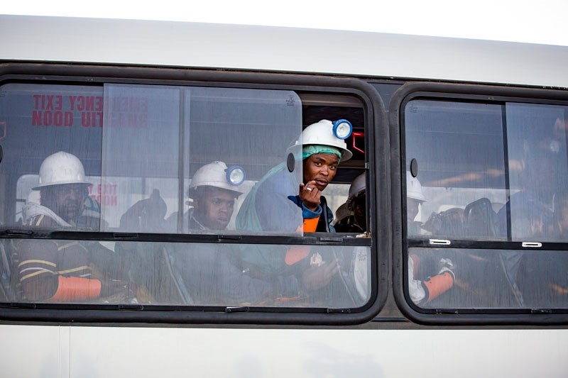 Miners who were trapped underground are transported to a safe holding area after being trapped underground at the Sibanye Stillwater's Beatrix mine, Welkom, South Africa, 02 February 2018 (EPA Photo)