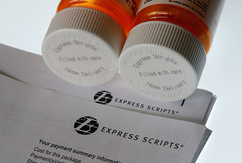 In this July 25, 2017, file photo, Express Scripts prescription medication bottles are arranged for a photo in Surfside, Fla., U.S. (AP Photo)
