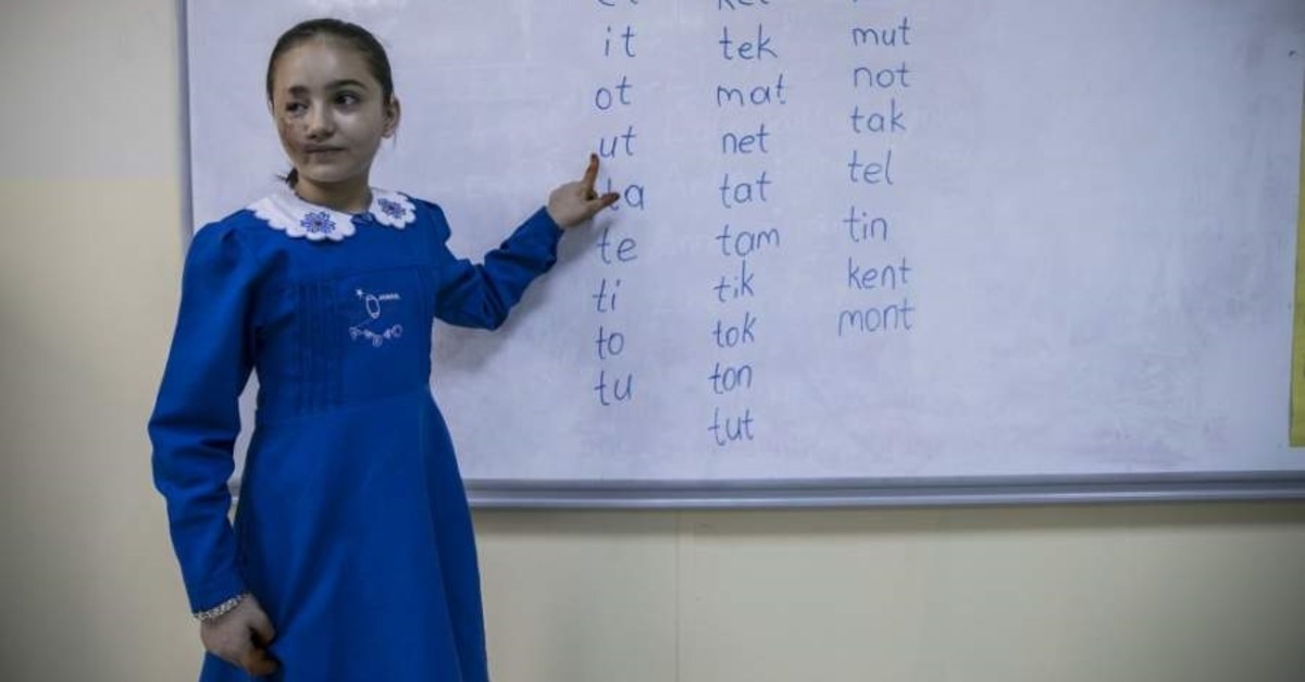 Lujain Kifretune attends a school in Hatay, where she arrived with her family 11 months ago. (AA Photo)