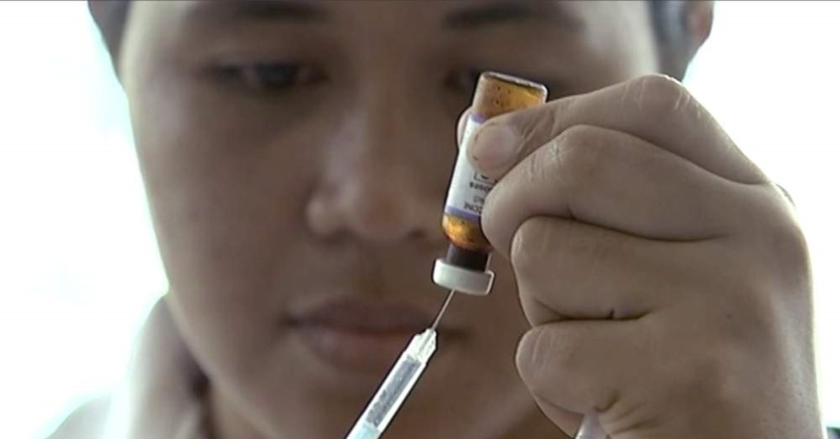 In this file image made from Nov. 25, 2019, file video, a New Zealand health official prepares a measles vaccination at a clinic in Apia, Samoa. (Newshub via AP)