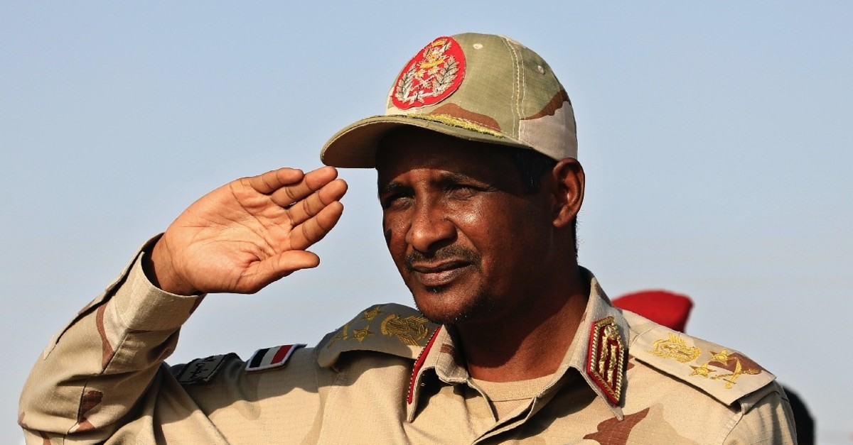 Gen. Mohammed Hamdan Dagalo salutes supporters during a rally, Galawee, June 15, 2019.
