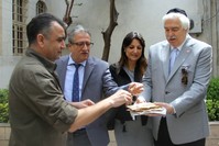 Local Jews served unleavened bread to guests at an event to mark Passover in the southern city of Hatay.