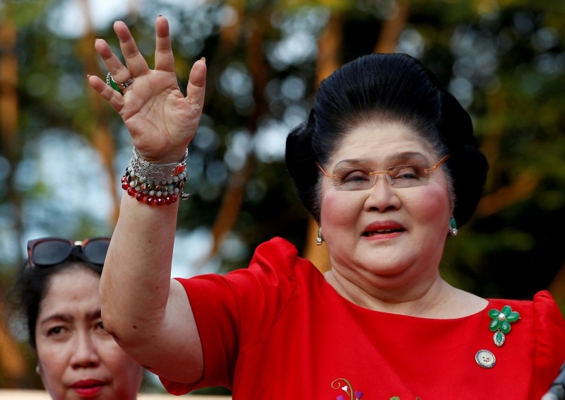 Philippines Former First Lady and Congresswoman Imelda Marcos waves to supporters as she takes part in the announcement of her son BongBong Marcos' vice-presidential candidacy, in Manila Philippines October 10, 2015. (Reuters Photo)