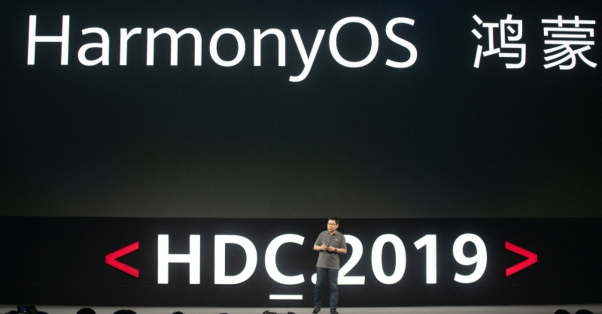 Richard Yu, head of Huawei's consumer business, unveils the company's new HarmonyOS operating system during a press conference in Dongguan, Guangdong province on August 9, 2019. (AFP Photo)