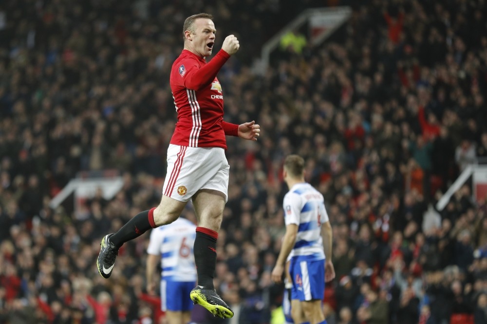 Manchester Unitedu2019s Wayne Rooney celebrates scoring their first goal.