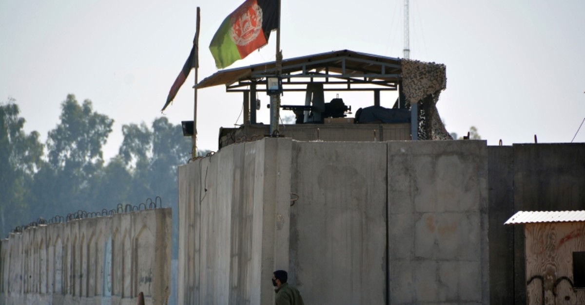 An Afghan security personnel stand guard in the checkpoint of airport after a suicide attack in Jalalabad province, east of Kabul, Afghanistan, Wednesday, March 6, 2019. (AP Photo)