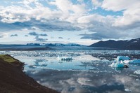The increase of carbon dioxide in the atmosphere is causing icebergs to melt in Iceland.  