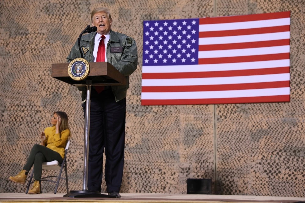 U.S. President Donald Trump delivers a speech to American troops in an unannounced visit to Al Asad Air Base, Iraq, Dec. 26, 2018.