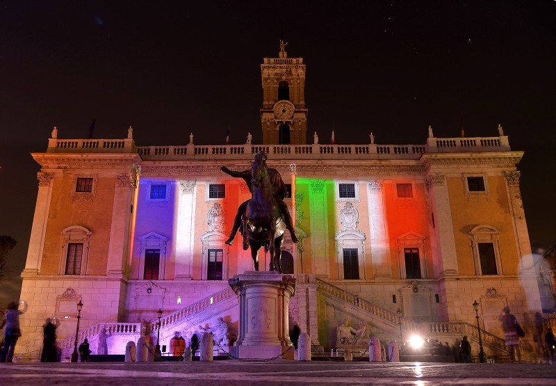 A file photo taken on January 30, 2016  shows the colours of the French and Italian flags projected on the Campidoglio in central Rome. (AFP Photo) 