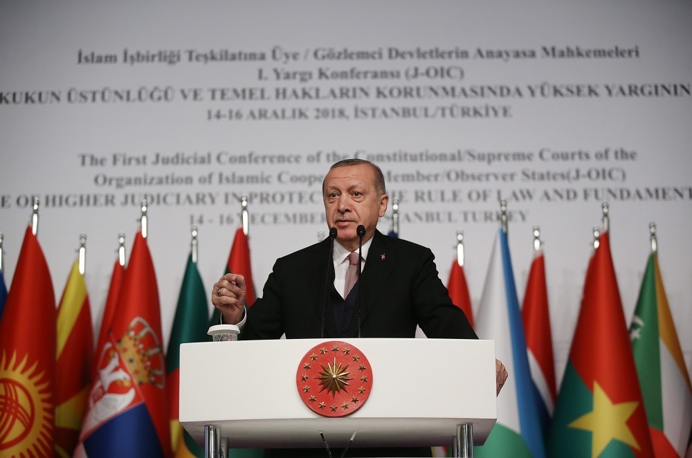 Recep Tayyip Erdou011fan addresses members of the Organisation of Islamic Cooperation (OIC) at a conference in Istanbul, Dec. 14.